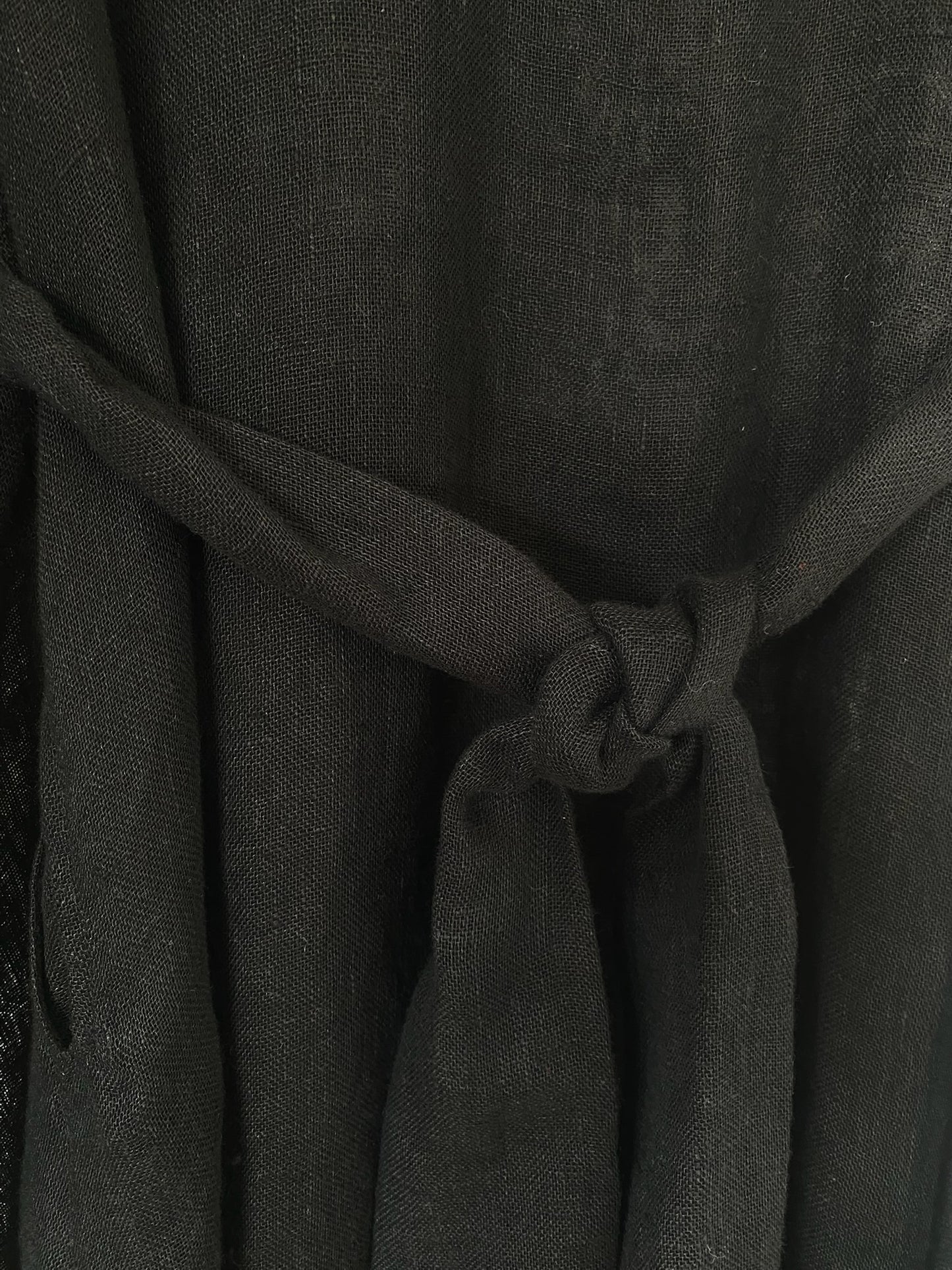 Black linen kaftan by MACOEY with midi silhouette, side pockets and detachable belt