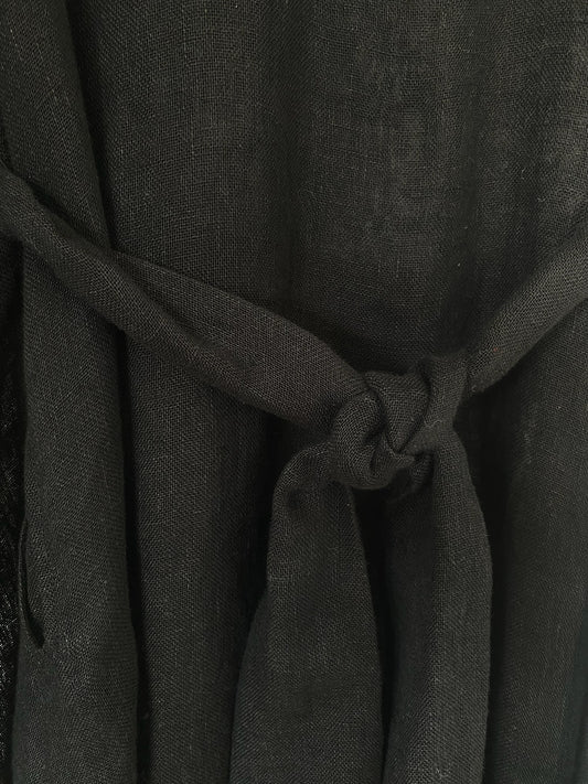 Black linen kaftan by MACOEY with midi silhouette, side pockets and detachable belt