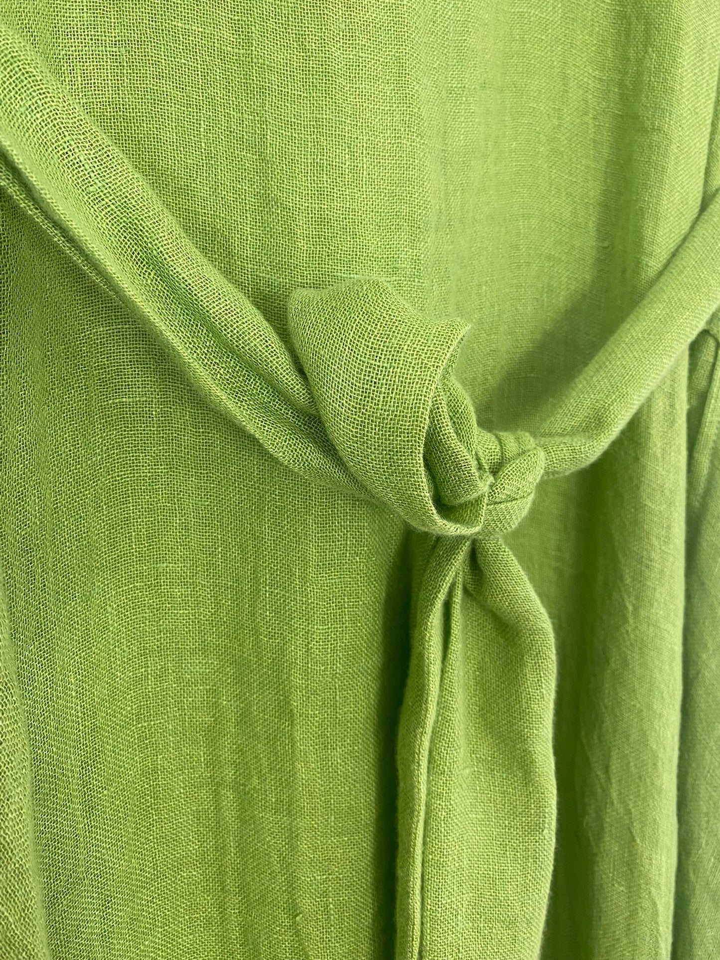Green linen kaftan by MACOEY with midi silhouette, side pockets and detachable belt