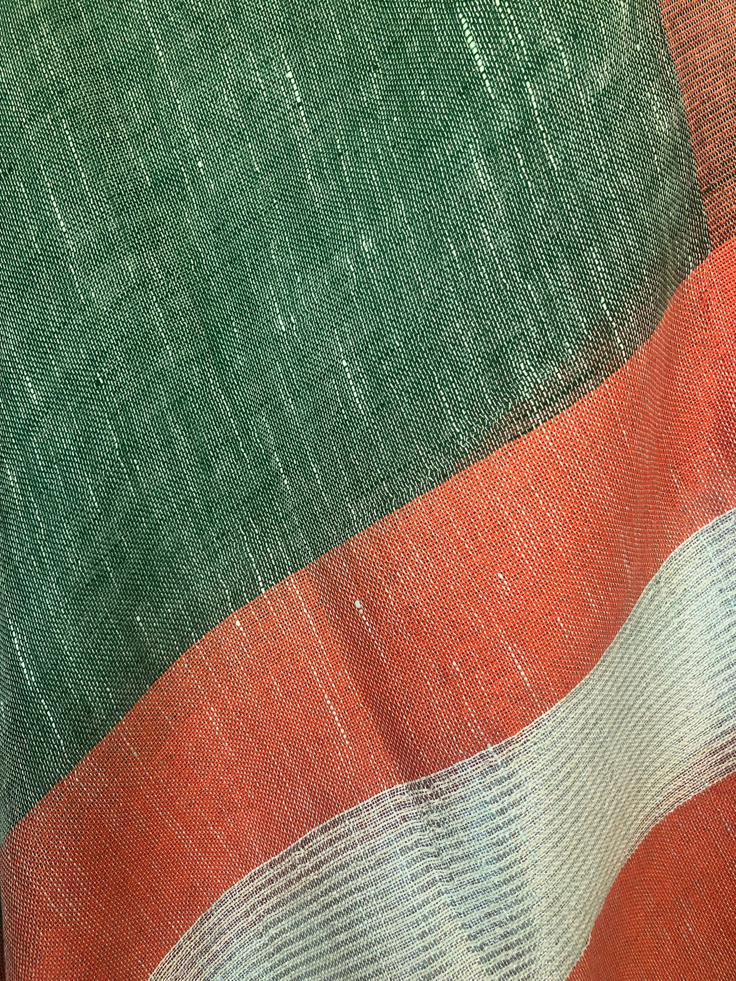 Green and orange linen coverup by MACOEY with striped border and tassels