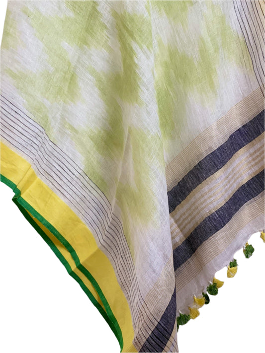 Green and yellow ikat linen coverup by MACOEY with contrasting border and tassels