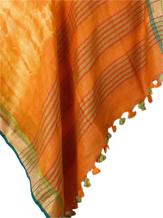 Orange tie-dye linen coverup by MACOEY with green accents and tassels