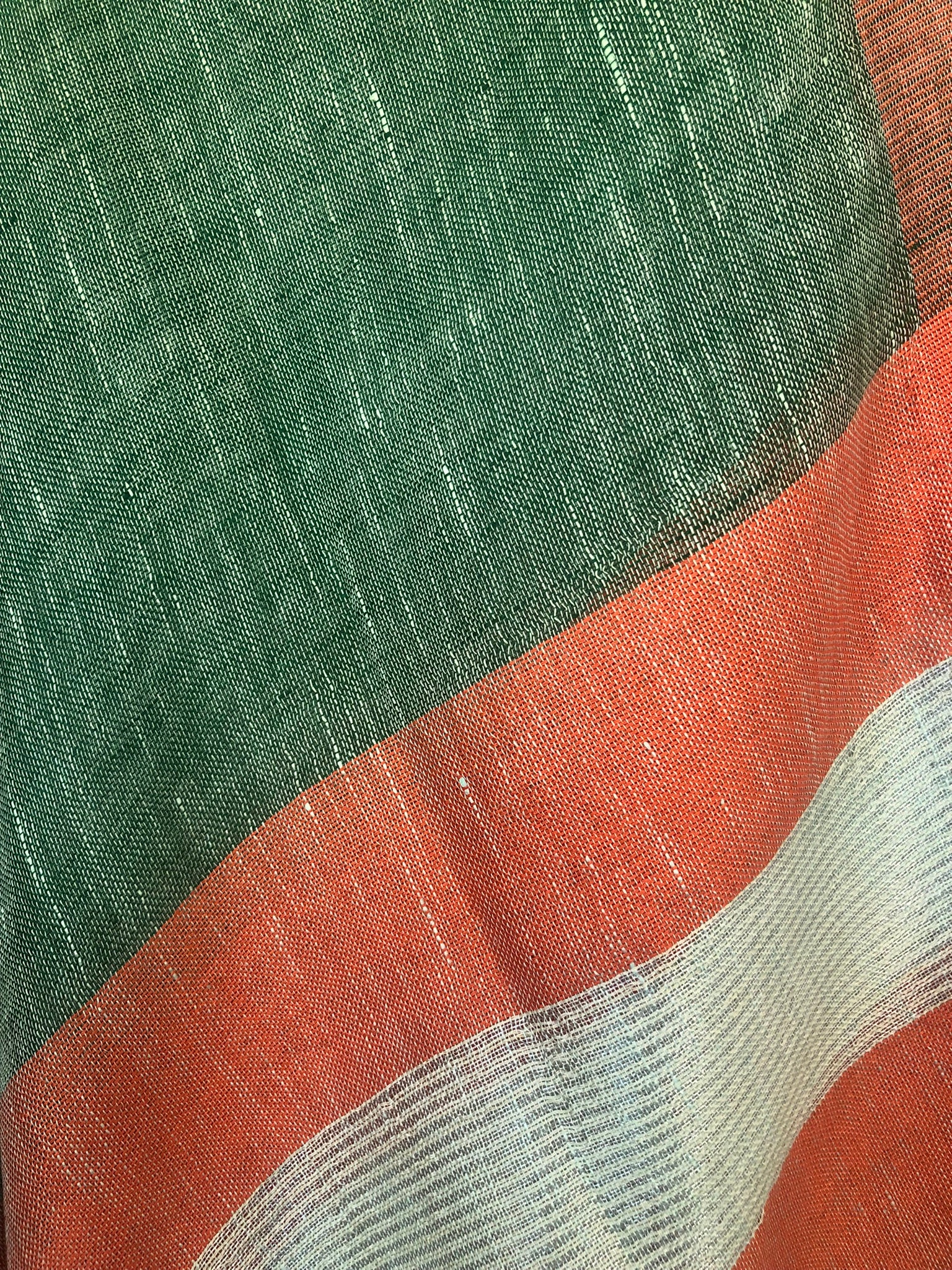 Green and orange linen coverup by MACOEY with striped border and tassels